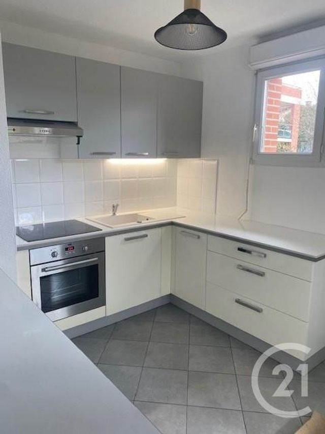 Appartement F4 à vendre - 4 pièces - 82.12 m2 - CUGNAUX - 31 - MIDI-PYRENEES - Century 21 Partenaire Immobilier